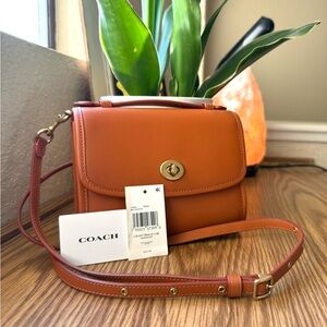 SOLD-Coach Kip Turnlock Crossbody -
Brass/Canyon
